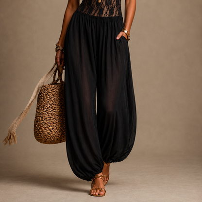 Tuta halter fluida con pizzo